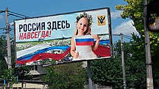Propagandistický plakát v okupovaném Chersonu se sdělením: „Rusko je zde... | na serveru Lidovky.cz | aktuální zprávy