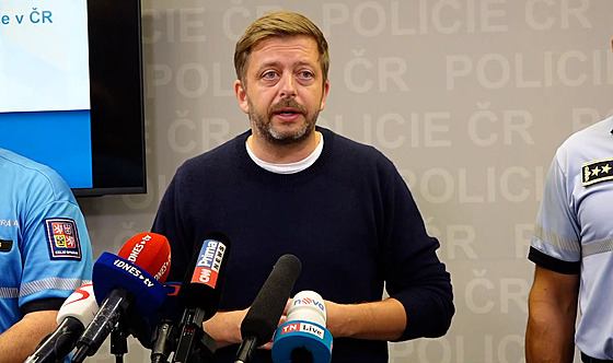 Ministr Vít Raku�an.