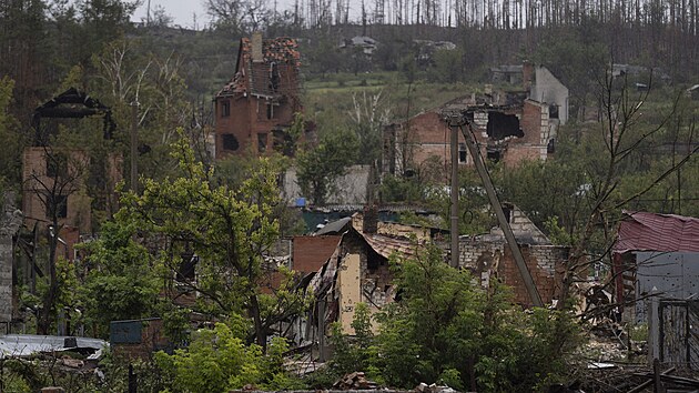 Poničené domy v Kupjansku, Charkovské oblasti (23. září 2022)