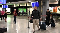 Ruští občané, kteří po ohlášení mobilizace přiletěli na letiště do arménského...