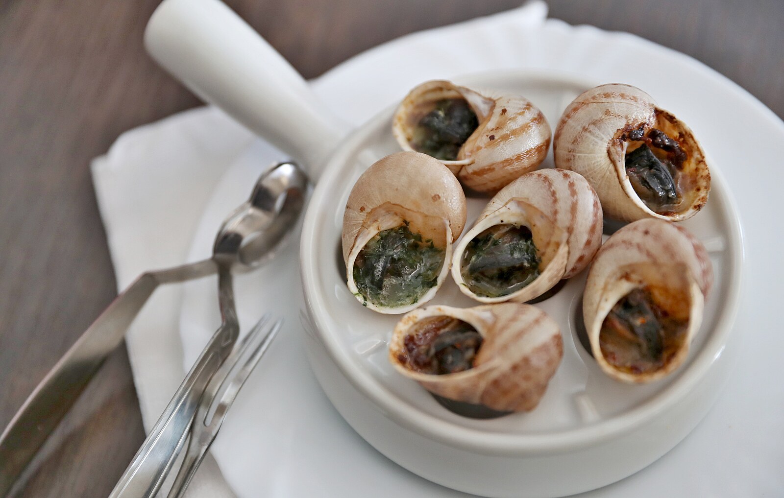 �neci v ulit� s bylinkov�m m�slem.