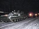 Ruská bojová vozidla po píjezdu na cviení v Blorusku. (18. ledna 2022)
