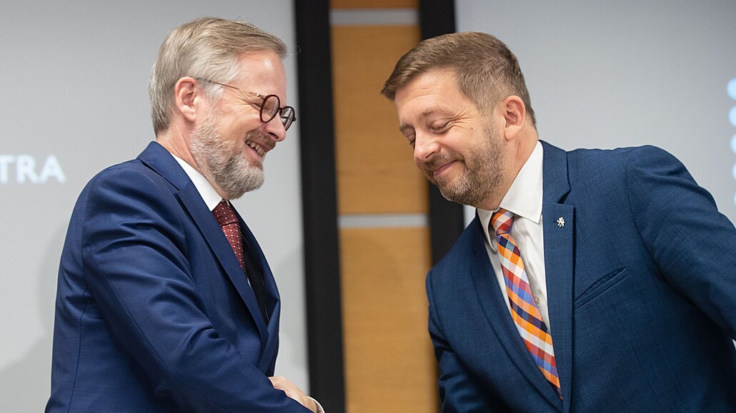 Premiér Petr Fiala (ODS) s ministrem vnitra Vítem Raku�anem (STAN) v rámci...