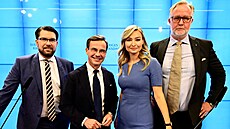 védská tyka: premiér Ulf Kristersson z Umírnné strany (druhý zleva),...