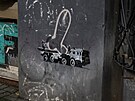Do dalího díla v Kyjev, jak se zdá, Banksy zalenil ji existující graffiti...