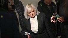 Obhájkyn� Petra Kramného Jana Rej�ková p�ed zahájením soudního �ízení. Uvedla,...