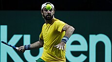 Australský tenista Jordan Thompson v duelu s Tallonem Griekspoorem z Nizozemska.