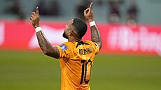 Nizozemský úto�ník Memphis Depay slaví sv�j gól proti Spojeným stát�m.