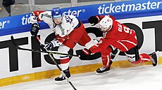 Damien Riat napadá rozehrávajícího Radka Ku�e�íka.