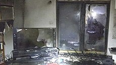 Následky po�áru váno�ního stromku v rodinném dom� na Praze 4. (24. prosince...