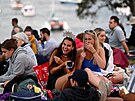 Lidé v australském Sydney ekají na píchod nového roku. (31. prosince 2022)