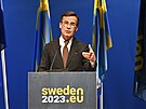 védský premiér Ulf Kristersson s logem védského pedsednictví v Rad EU (13....