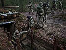 Ukrajintí vojáci brání pozice na hranici s Bloruskem. (13. ledna 2023)