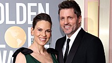 Manželé Hilary Swanková a Philip Schneider na Zlatých glóbech (Los Angeles, 10....