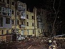 Ruská raketa zasáhla bytový dm v ukrajinském Charkov. (29. ledna 2023)