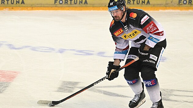 Swedish defender in Sparta Stefan Warg holds the puck during the match against Karl...