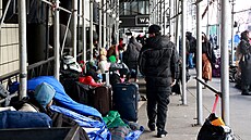 Migranti, kteí se odmítli pesthovat do brooklynského dopravního terminálu,...