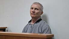 Alexej Moskalyov sedí v soudní síni v Jefremov v Tulské oblasti. (27. bezna...