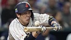 Japonský baseballista Takuja Kai na pálce