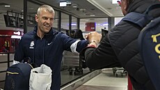 Asistent trenérky �eských hokejistek Du�an Andra�ovský po návratu z bronzového...