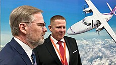 Premiér Petr Fiala s prezidentem Omnipolu Jiím Podprou.