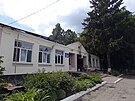 Poniená budova v Belgorodské oblasti, kde probíhají boje mezi ruskými...