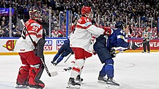 Jacob Gammelgaard kros�ekuje p�ed brankou Kasperiho Kapanena.