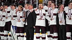 Lotyšští hokejisté oslavují zisk historických bronzových medailí ze světového...