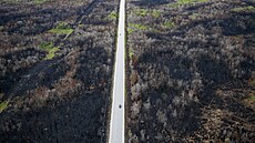Škody způsobené lesním požárem v oblasti Tantallon v Kanadě. (22. června 2023)
