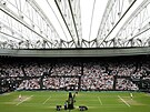 Finále Wimbledonu mezi Markétou Vondrouovou a Uns Dábirovou