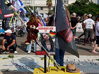Fotka Shani Nicole Loukov na demonstraci v Tel Avivu, kterou uspodali...