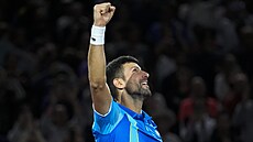 Srbský tenista Novak Djokovi� se raduje z vít�zství nad Grigorem Dimitrovem z...