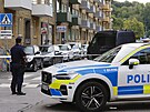 �védská policie zasahuje po útoku gang� v Göteborgu. (31. srpna 2023)