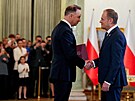 Nový premiér Donald Tusk sloil u polského prezidenta Andrzeje Dudy písahu. O...
