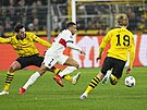 Kylian Mbappé (7) utíká obran Dortmundu.