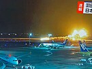 Letadlo Japan Airlines zaalo hoet po nouzovém pistání na letiti Haneda