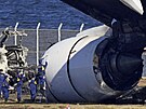 Letecká spolenost Japan Airlines vypoítala následky nehody na letiti Haneda...