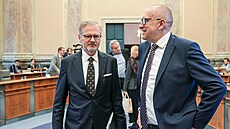 Premiér Petr Fiala a ministr školství Mikuláš Bek před jednáním vlády 31. ledna...