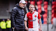 Slávistický trenér Jindich Trpiovský v debat s Petrem evíkem.