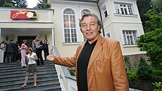 Karel Gott se jako jeden z mála do�kal vlastního muzea, Gottlandu, u� za svého...