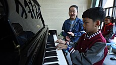 Výuka klavírních lekcí v ínském mst Che-fej (12. íjna 2020)