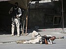 Policisté na Haiti bojují proti zloineckým gangm. (3. bezna 2024)