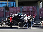 Ozbrojené gangy vnikly do věznice v haitském hlavním městě a osvobodily...