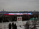 Ruské prezidentské volby v Moskv: Na snímku text Pobda budt za nami, co...