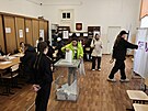 Rusové ve Vladivostoku volí v prezidentských volbách. (17. bezna 2024)