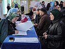 Rusové v Grozném volí v prezidentských volbách. (16. bezna 2024)