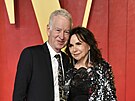 John McEnroe a Patty Smythová na Vanity Fair Oscar party (Los Angeles, 10....