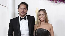 Tom Ackerley a Margot Robbie na Oscarech (Los Angeles, 10. března 2024)