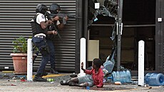Policie bhem rozsáhlého protivládního protestu v Port-au-Prince na Haiti,...