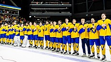 Radost ukrajinských hokejist z výhry nad Litvou a postupu.